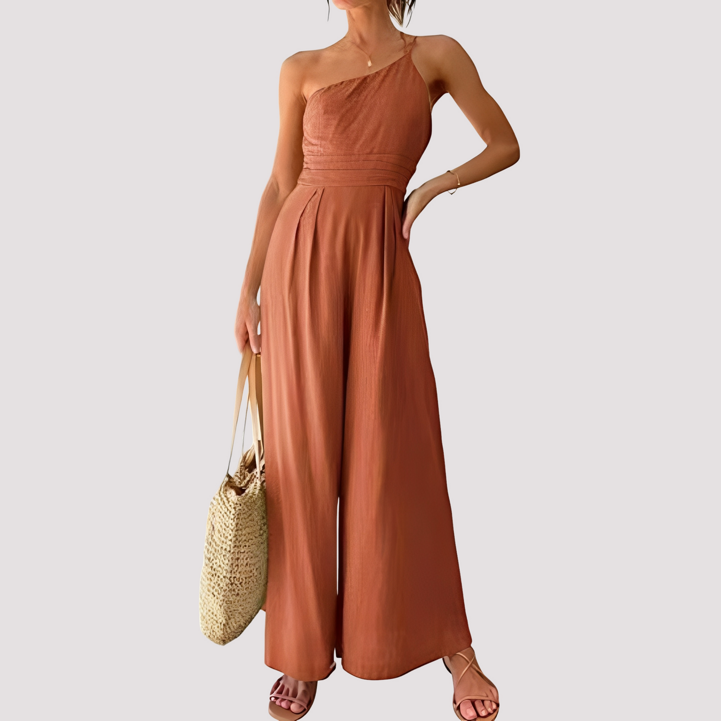 Carla - Tenue chic pour femme avec une épaule et jambes larges